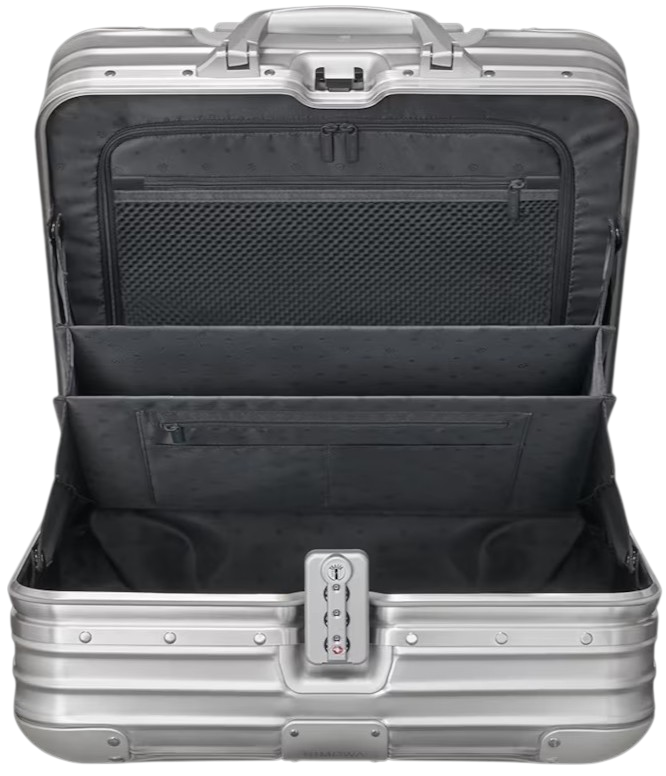 Interior da RIMOWA Original Compact mostrando organizadores em mesh