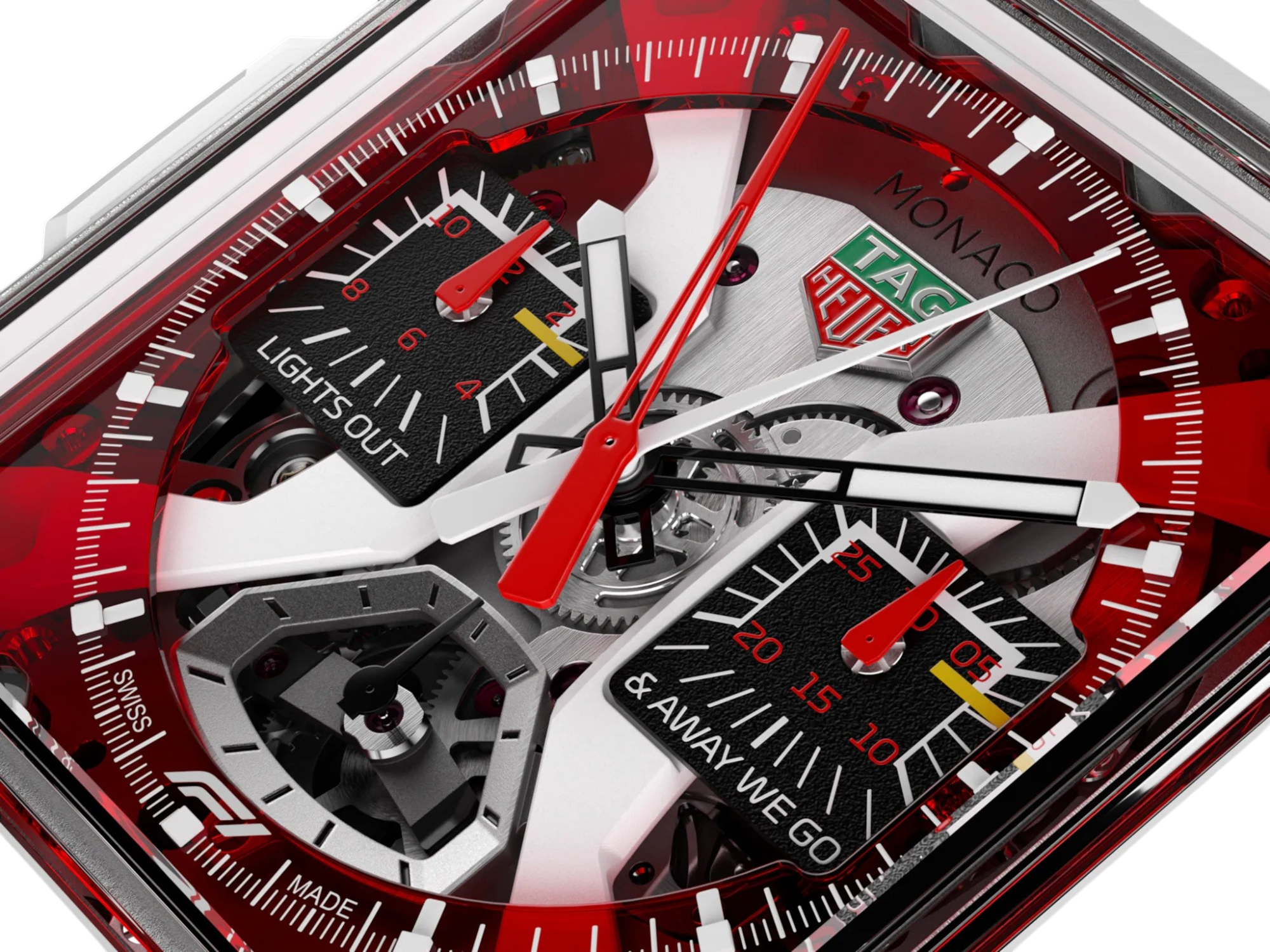 Close do mostrador vermelho translúcido do TAG Heuer Monaco Split-Seconds exibindo detalhes do grid de largada